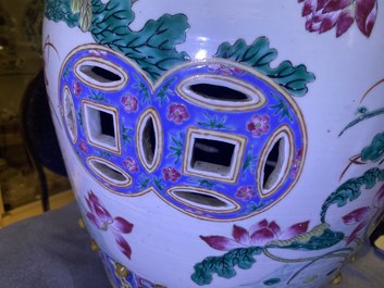 A Chinese famille rose 'ducks in a lotus pond' garden seat, 19th C.